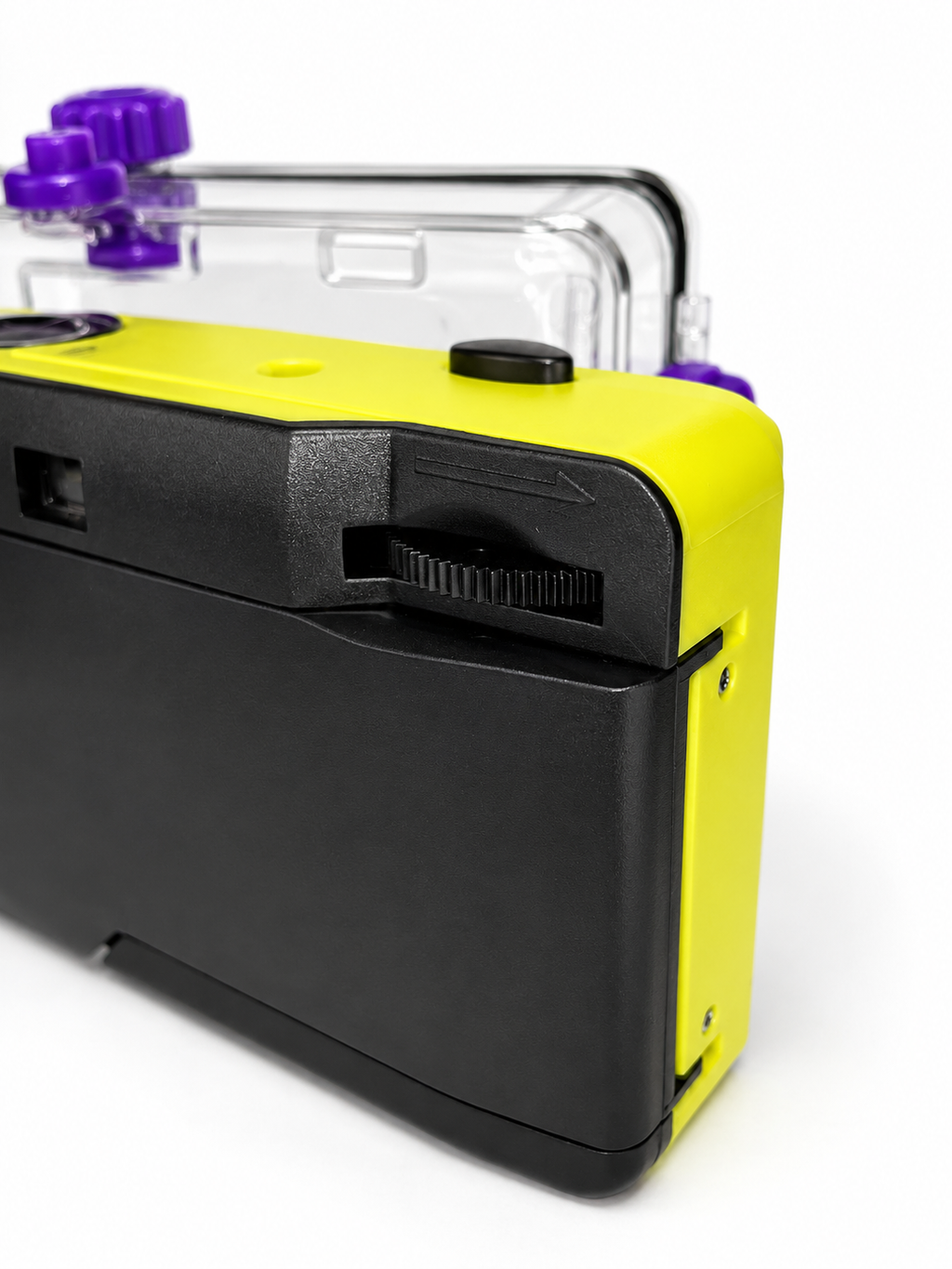 Yellow and black electronic device with a clear plastic cover on a white background
